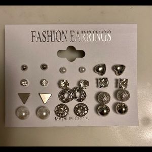 Set of 12 pairs of silver plated stud earrings.